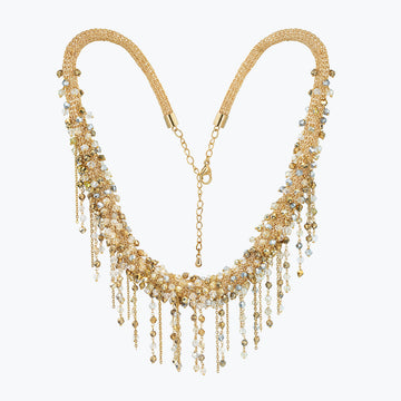 Handknitted wire mesh collar necklace featuring gold, champagne, and clear premium crystals with fringe details.