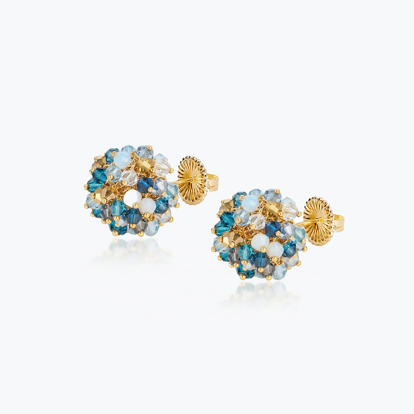 Handknitted wire ball stud earrings in gold with various shade of blue premium crystals.