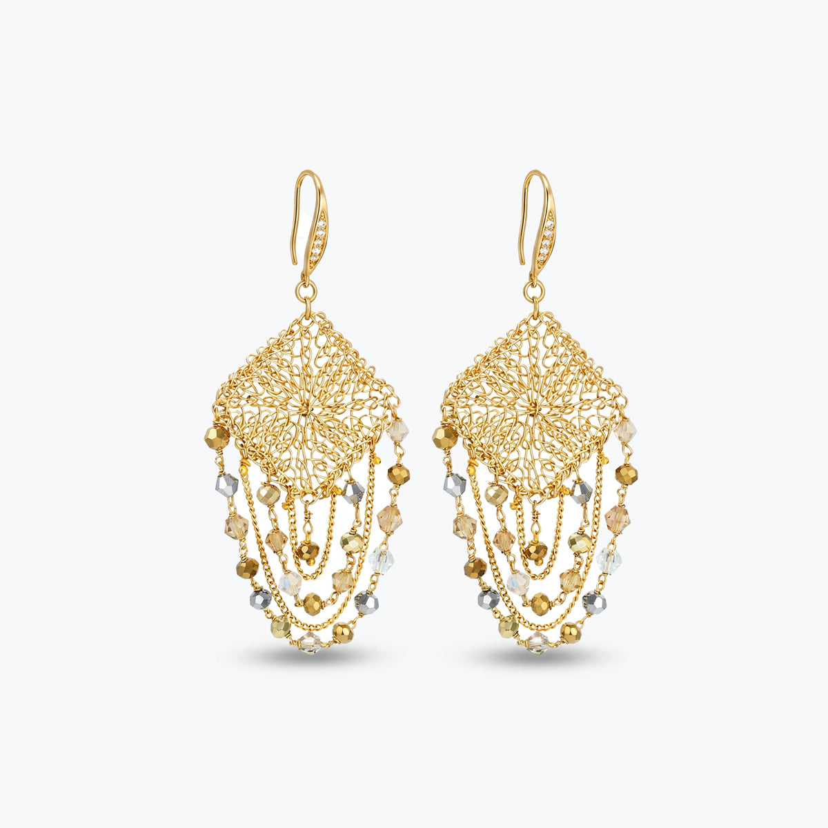 Gold drop earrings featuring a diamond-patterned handknitted wire square panel and tiered strands of premium gold crystals.
