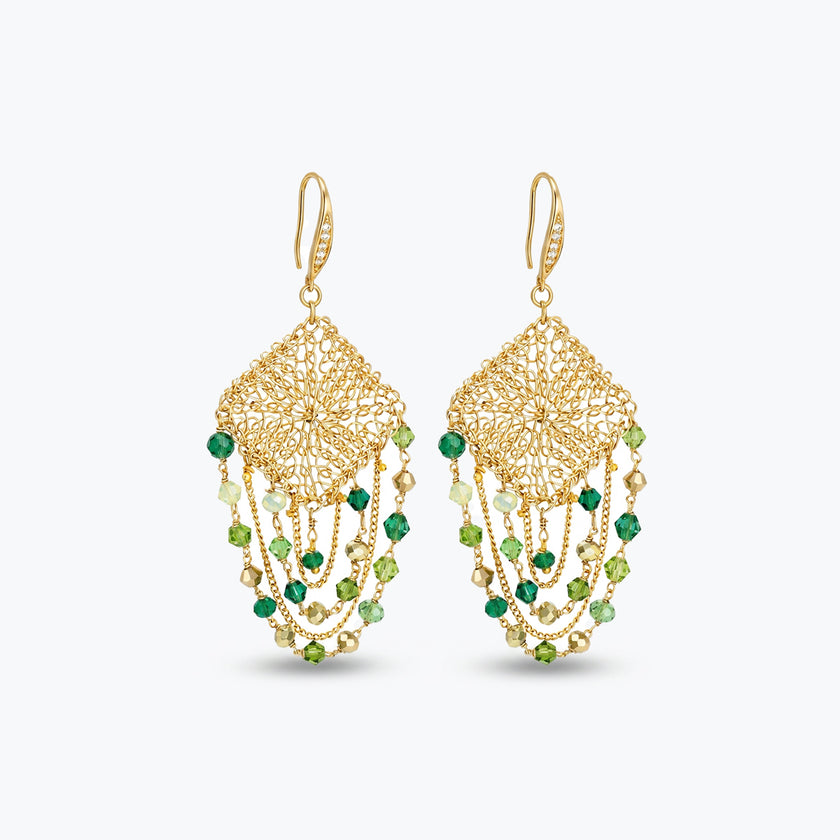 Gold drop earrings showcasing a diamond-shaped handknitted wire square panel with suspended rows of green premium crystals.
