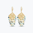 Gold drop earrings with a diamond-shaped handknitted wire mesh square panel and cascading strands of blue reflective crystals.
