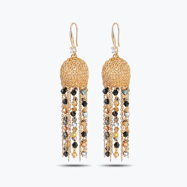 Gold drop earrings featuring a sphere-shaped handknitted wire shape and tassel strands of black and bronze crystals.