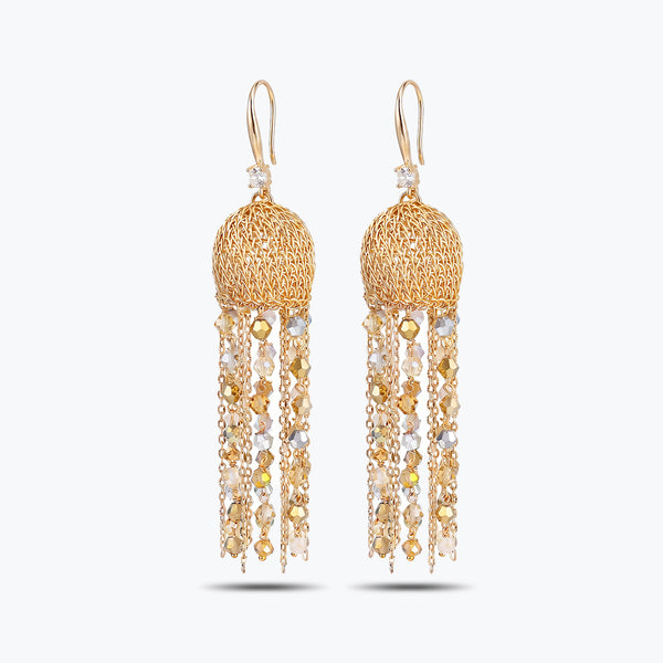 Gold drop earrings featuring a spherical handknitted wire mesh cap and straight tassel lines of clear premium crystals.
