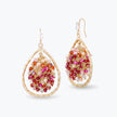 Gold drop earrings with handknitted wire mesh teardrop shape holding individually hanging pink and red crystals.