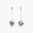Gold drop earrings featuring a handknitted wire ball with suspended blue and silver reflective crystals.
