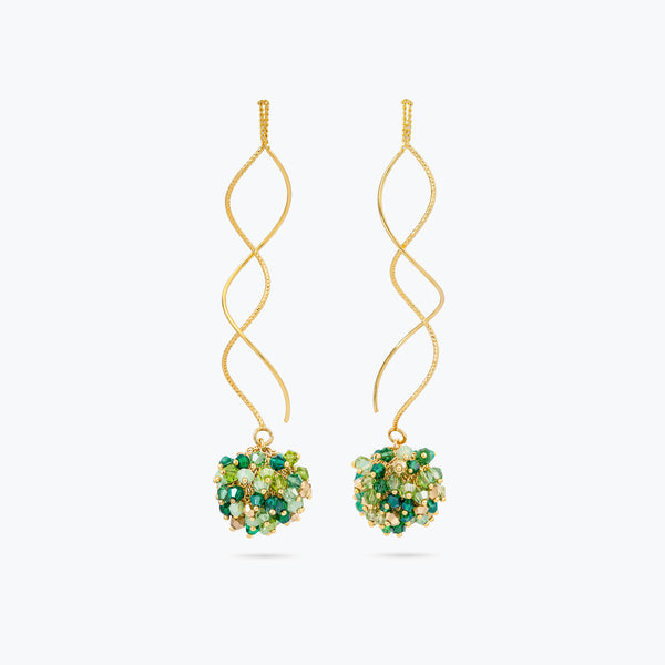 Gold spiral long earrings featuring a cluster of premium crystals in vibrant emerald and lime green hues.