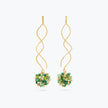Gold spiral long earrings featuring a cluster of premium crystals in vibrant emerald and lime green hues.