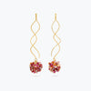 Gold spiral drop earrings with a rounded bunch of premium crystals in red, pink, and orange tones.