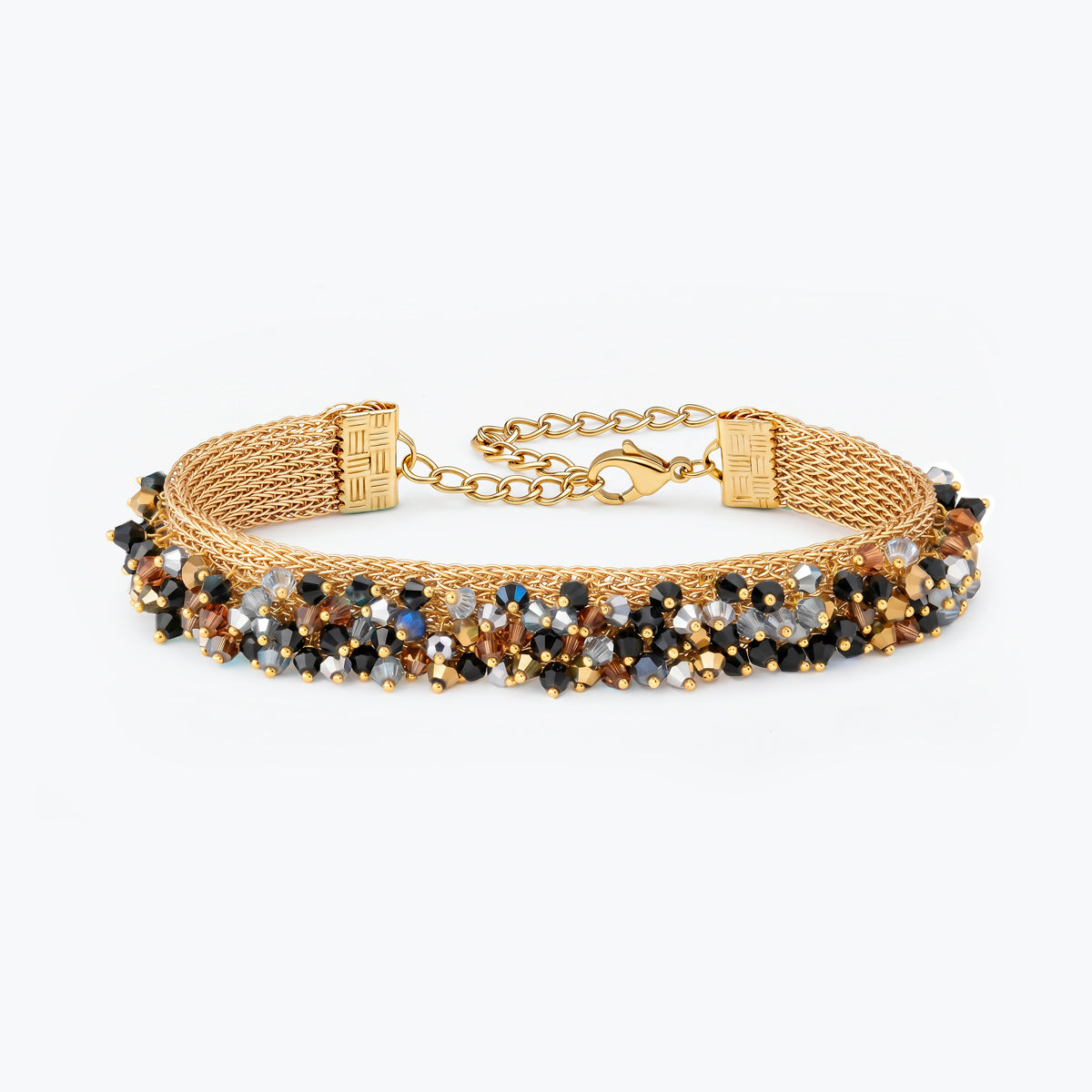 Gold handknitted wire mesh bracelet embellished with reflective crystals in black, bronze, and silver.