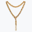 Gold handwoven wire mesh bolo-tie necklace encrusted with champagne, clear, and amber premium crystals.