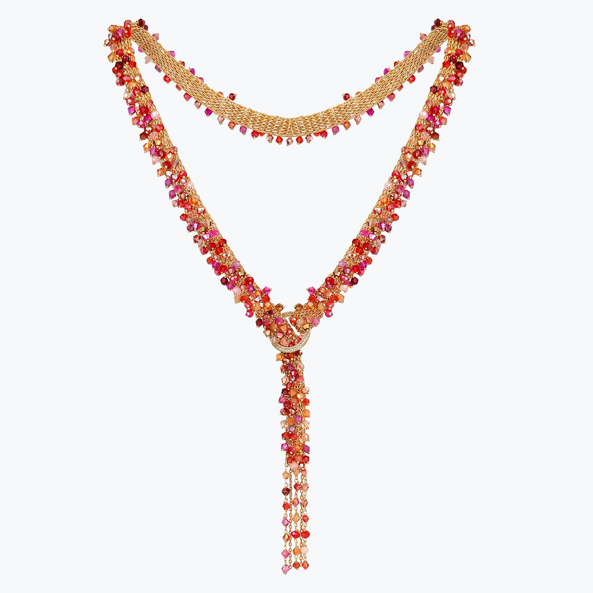 Gold bolo-tie necklace meticulously made of handwoven wire mesh with fuchsia and red reflective crystals.