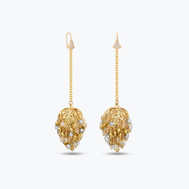 Elegant gold drop earrings with handknitted wire pods and individually hanging crystals in soft champagne gold tones.