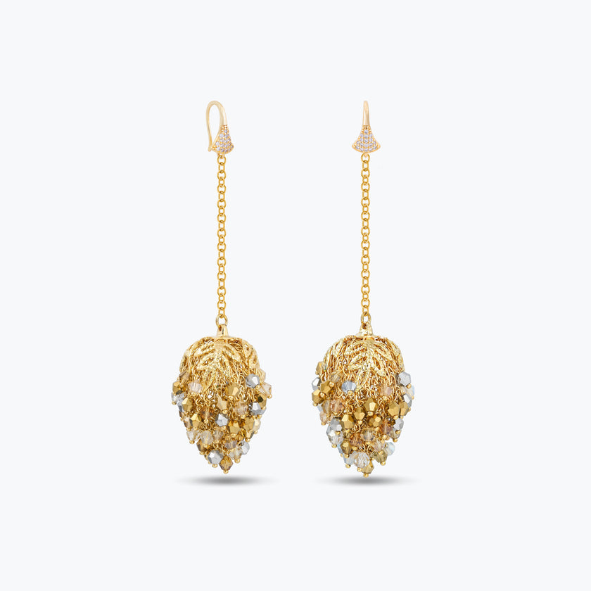 Elegant gold drop earrings with handknitted wire pods and individually hanging crystals in soft champagne gold tones.