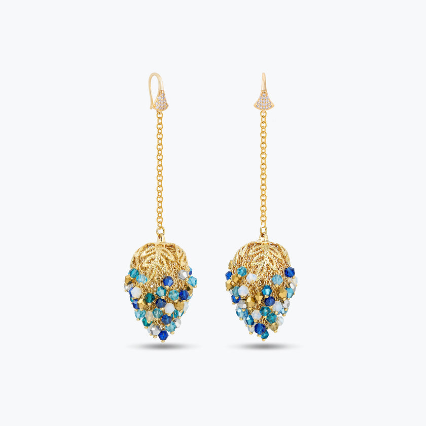 Long gold chain drop earrings with a handknitted wire mesh pod cluster of blue shades premium crystals.