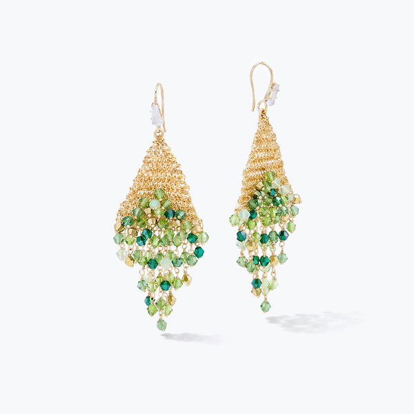 Gold drop earrings with a  handknitted wire triangular shape and dense rows of hanging green reflective crystals.