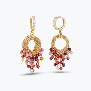 Gold wire hoop earrings showcasing multi-tonal premium hanging crystals in vibrant ruby red, pink hues.