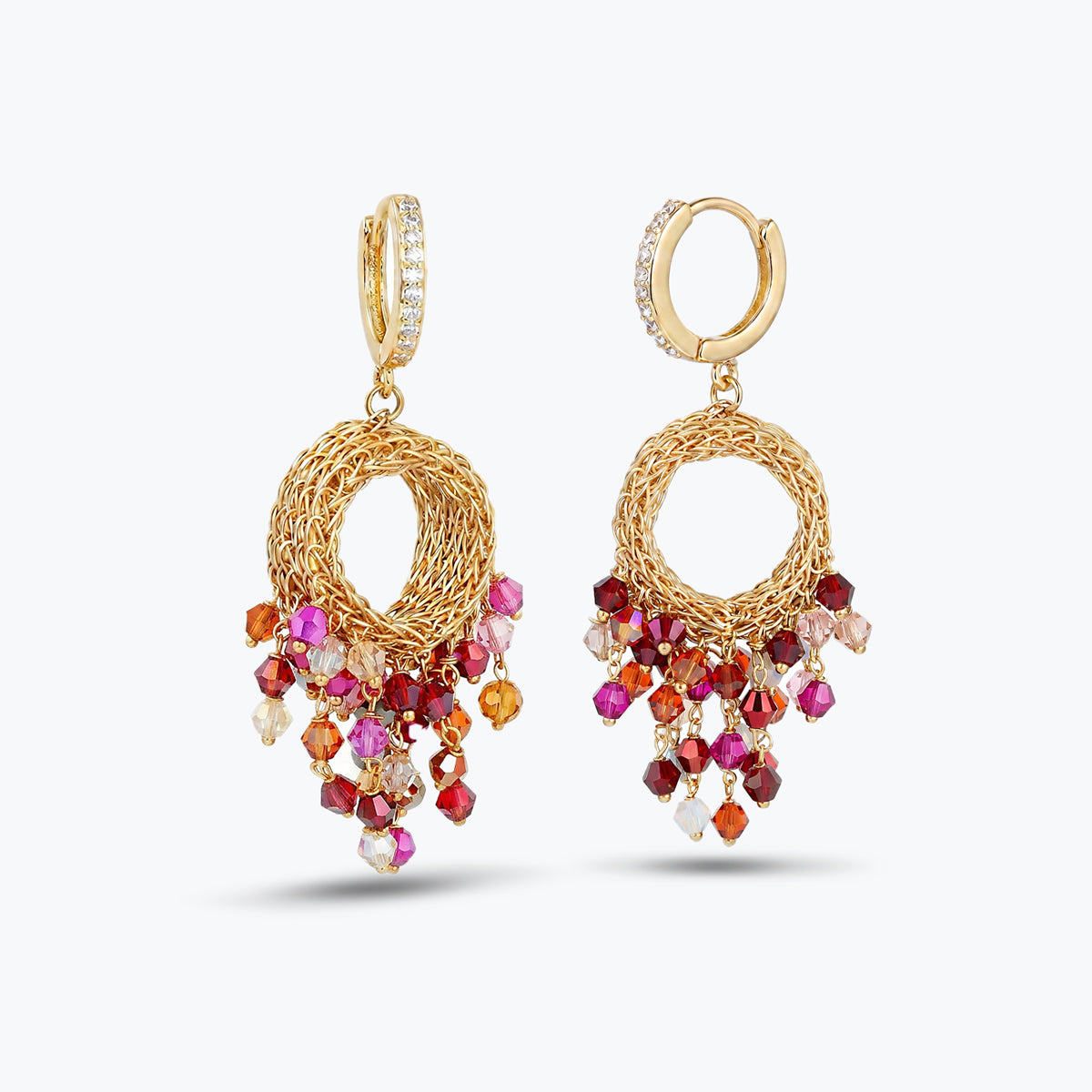 Gold wire hoop earrings showcasing multi-tonal premium hanging crystals in vibrant ruby red, pink hues.