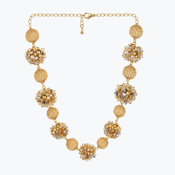 Gold handknitted sphere wire mesh ball necklace featuring individually champagne and gold tones.