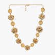 Gold handknitted sphere wire mesh ball necklace featuring individually champagne and gold tones.