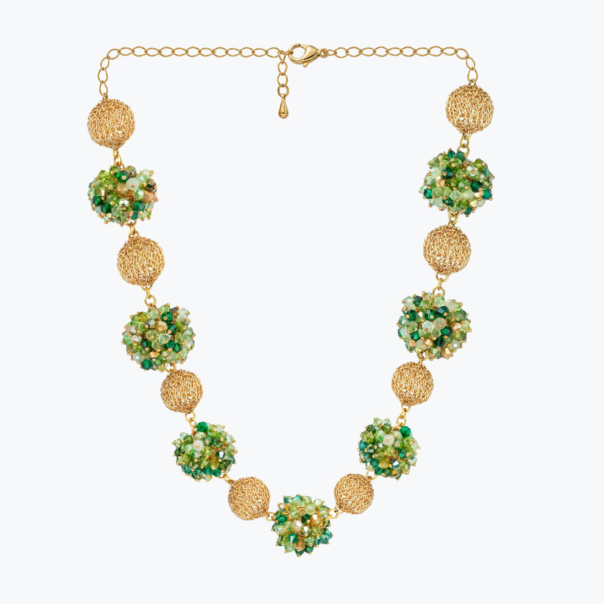 Gold handknitted sphere wire mesh ball necklace featuring individually green, emerald, and olive premium crystals.