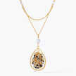 Gold handknitted tear drop wire mesh bib necklace showcasing reflective crystals in metallic, silver and black.
