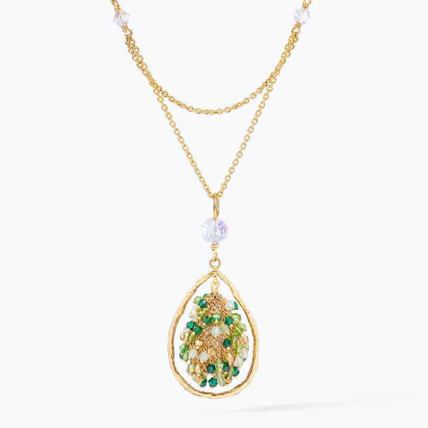 Gold handknitted tear drop wire mesh pendant necklace displaying a crescent cluster of green premium crystals.