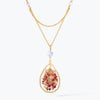 Gold handknitted tear drop wire mesh bib necklace with premium crystals in vibrant reds.