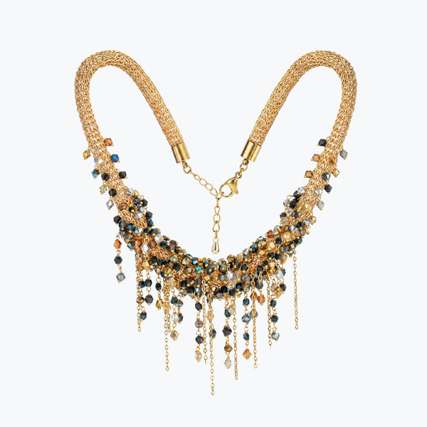 Gold handknitted wire mesh collar necklace decorated with individually hanging metallic, black, and bronze crystals.