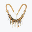 Gold handknitted wire mesh collar necklace decorated with individually hanging metallic, black, and bronze crystals.