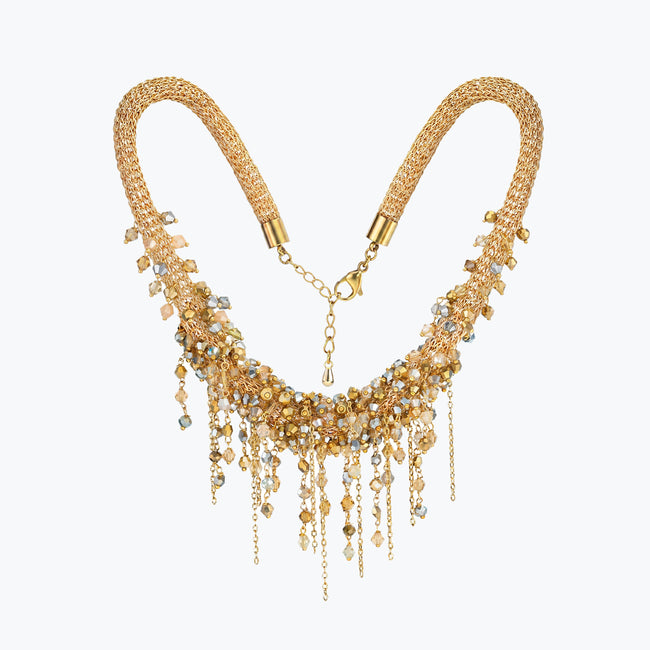 Gold handknitted wire mesh collar necklace featuring individually hanging champagne and gold reflective crystals.