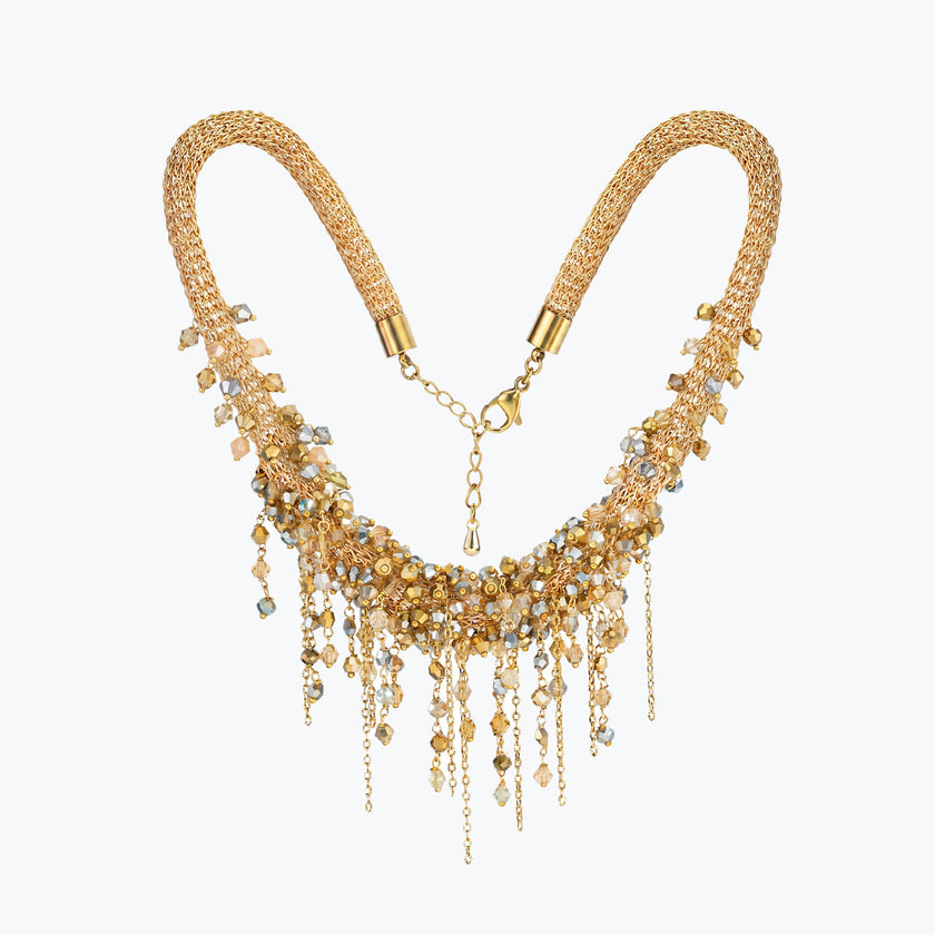 Gold handknitted wire mesh collar necklace featuring individually hanging champagne and gold reflective crystals.