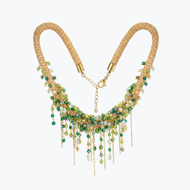 Gold handknitted wire collar necklace adorned with individually hanging premium green and emerald crystals.