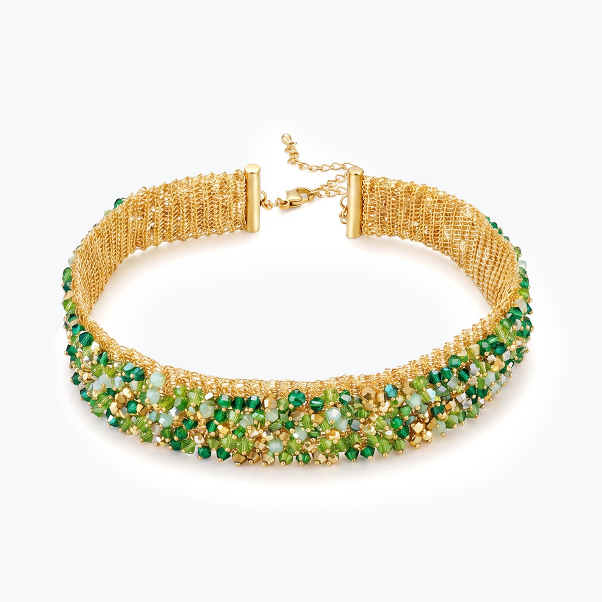 Gold handknitted wire mesh choker necklace adorned with individually hanging premium crystals in green hues.
