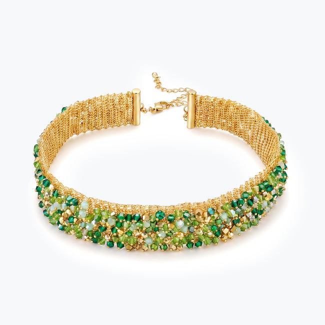 Gold handknitted wire mesh choker necklace adorned with individually hanging premium crystals in green hues.