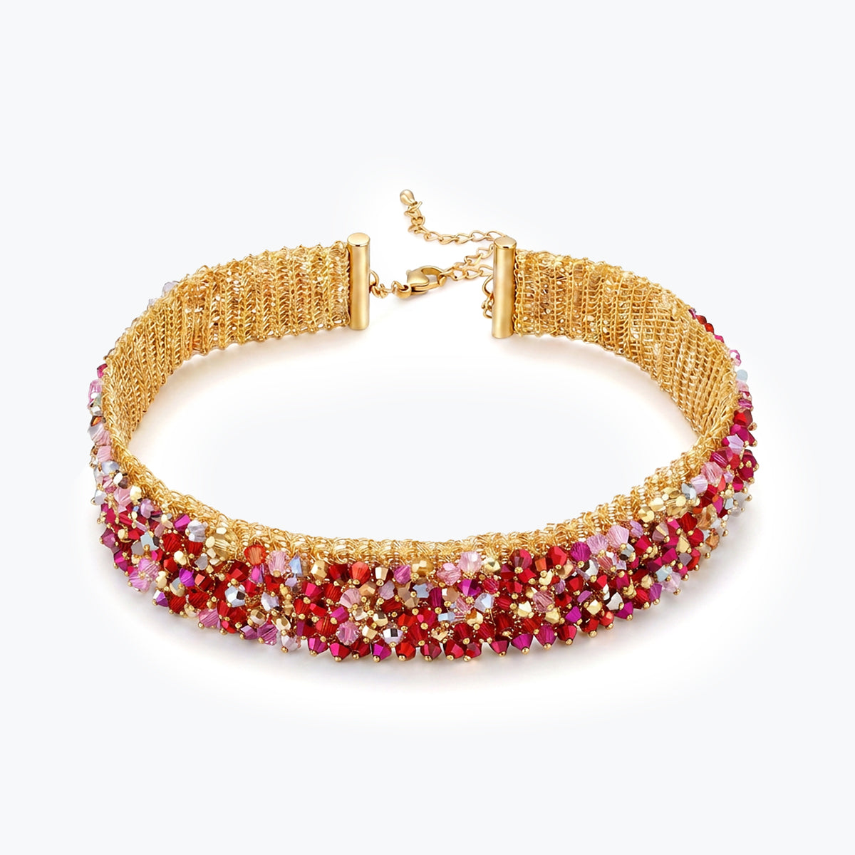 Handknitted gold wire mesh choker necklace featuring reflective premium crystals in red and pink tones.