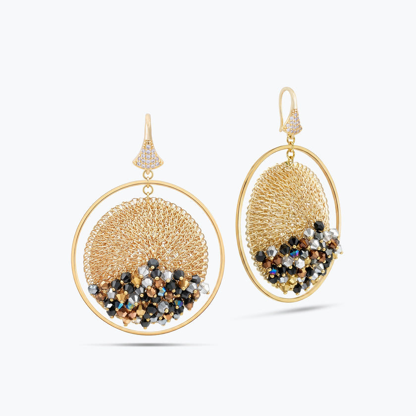 Gold handknitted wire mesh hoop earrings with reflective crystals in bronze, black, and metallic silver.