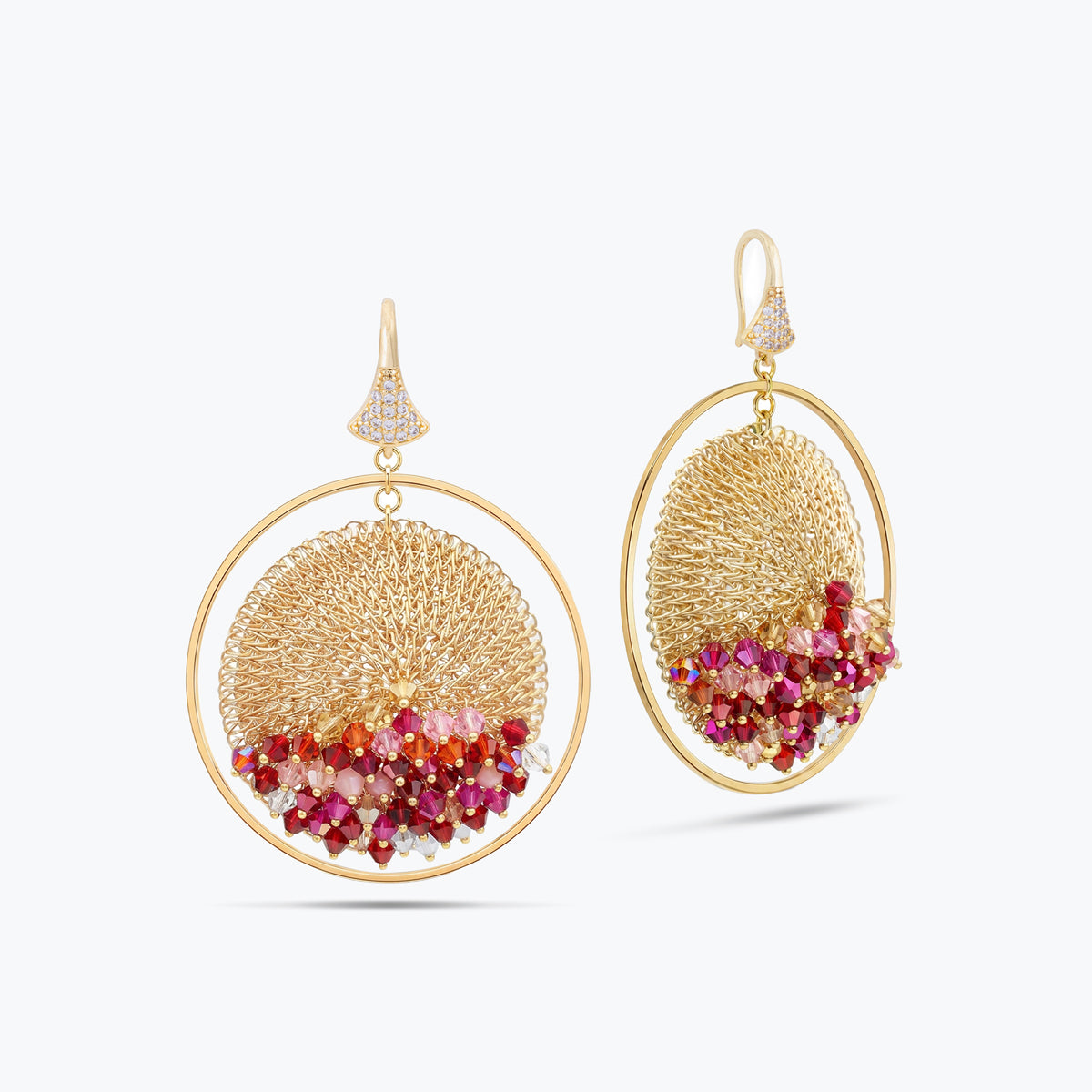 Gold handknitted wire hoop earrings decorated with premium crystals in vibrant red, burgundy, and pink hues.